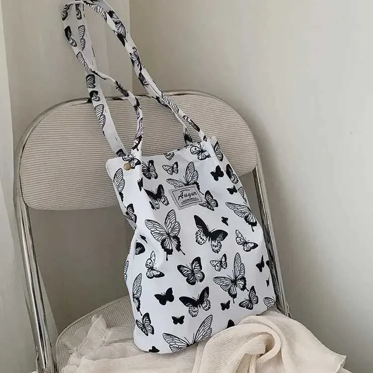 Sac à main en toile imprimé léopard pour femme, mode coréenne décontractée, nouveau sac de shopping, sac à main imprimé pour étudiant, Bolsa Mujer Y241026_voghion.com