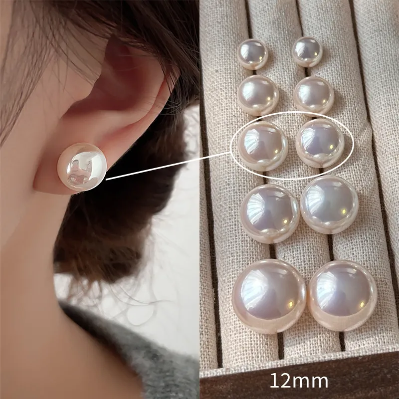 Orecchini a lobo con perle donna eleganti rotondi bianchi rosa_voghion.com