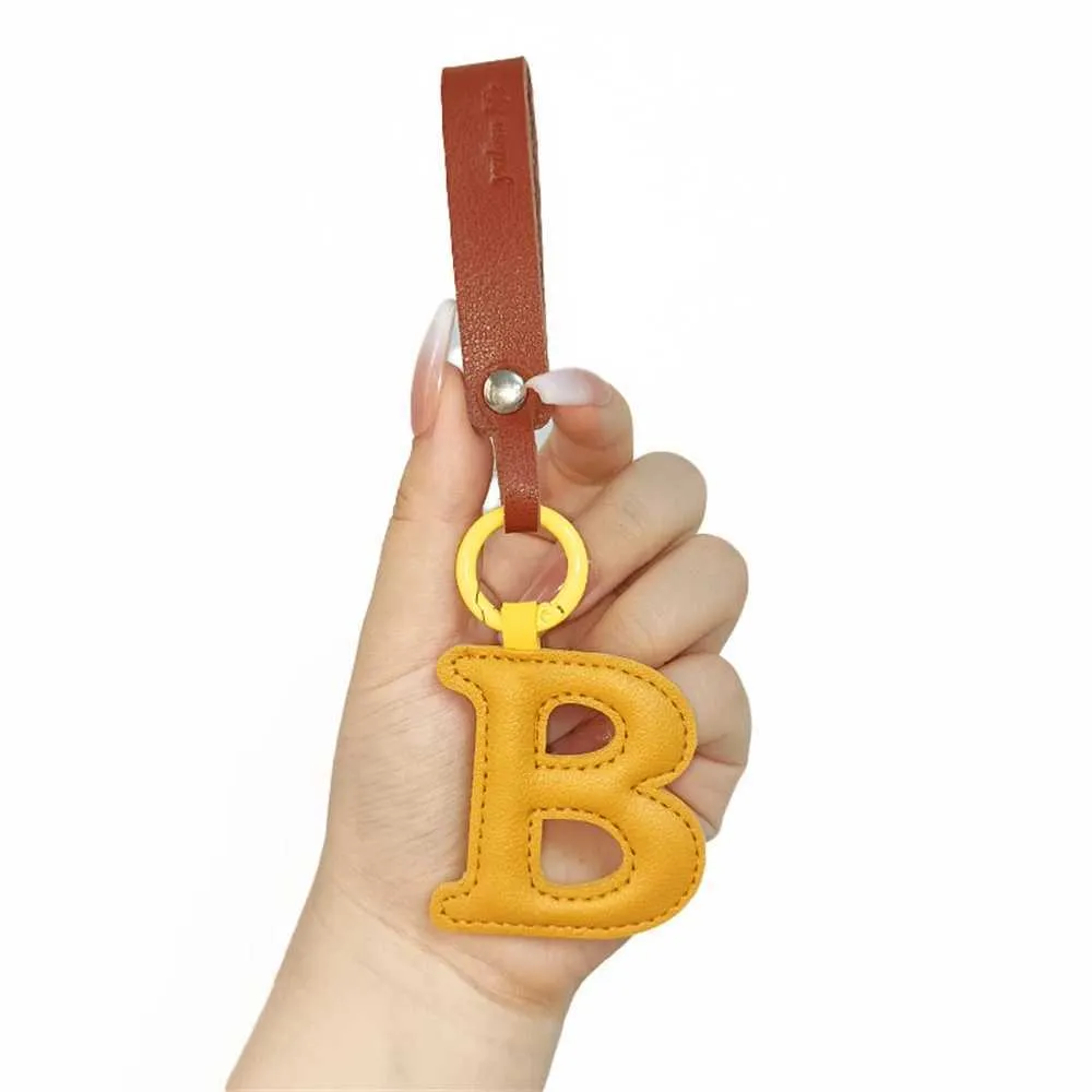 Creative leather English letter keychain pendant decoration phone bag accessories gift Y241121_voghion.com