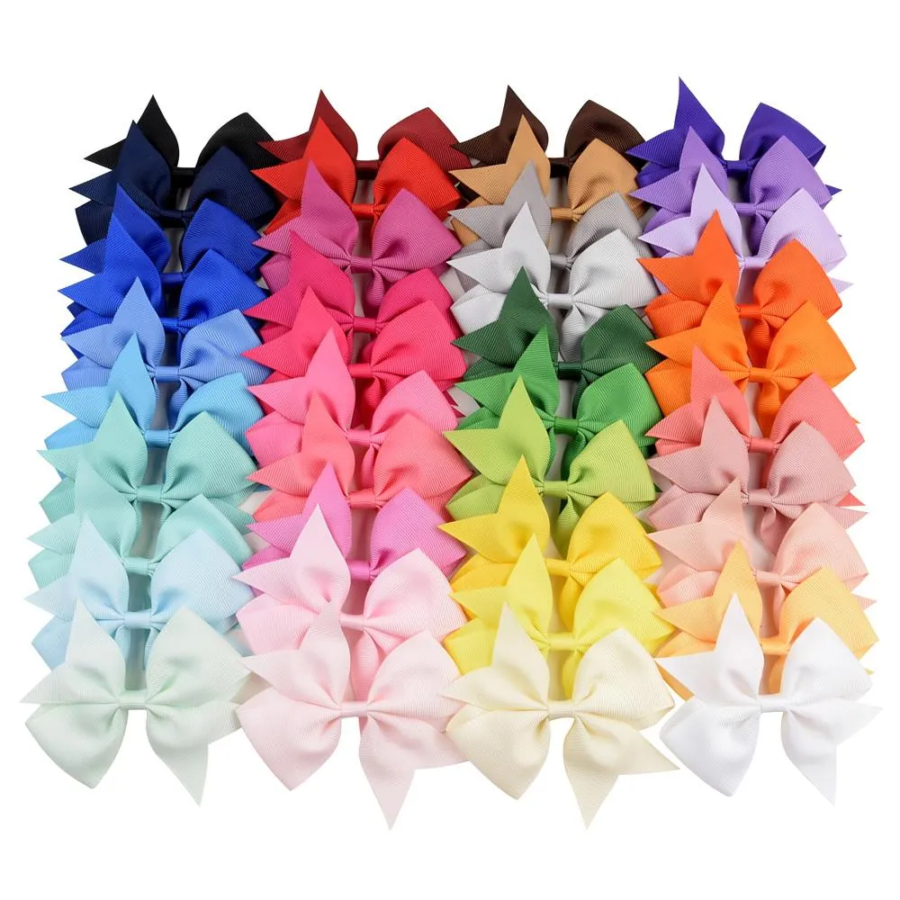 40 db/tétel Többszínű, tömör grosgrain szalagos masni klipszel lányoknak, kézzel készített butik klipszek hajcsattal_voghion.com