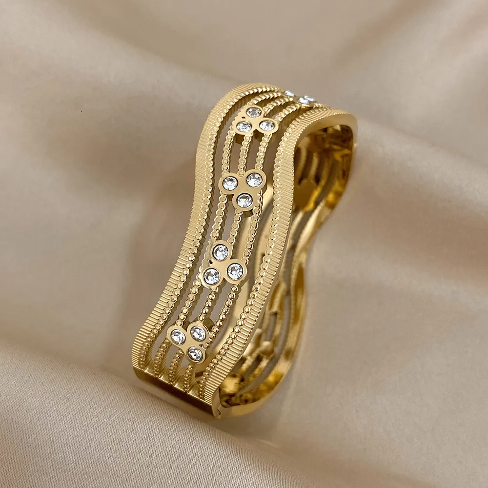 Bracciale rigido statement placcato oro design geometrico_voghion.com