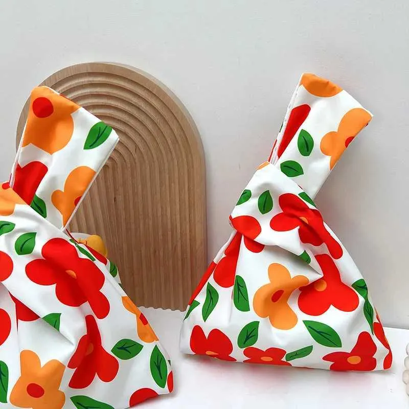 Ausgefallene tragbare Mini-Knoten-Wending-einfache Handtasche Einkaufstasche Schlüsseltasche Münzgeldbörse Y241106_voghion.com