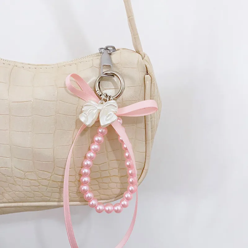 Portachiavi con fiocco in nastro, perline e perle, bianco latte, con nodo a farfalla, ciondolo per borsa da bambina, ciondoli per zaino, decorazioni e regali._voghion.com