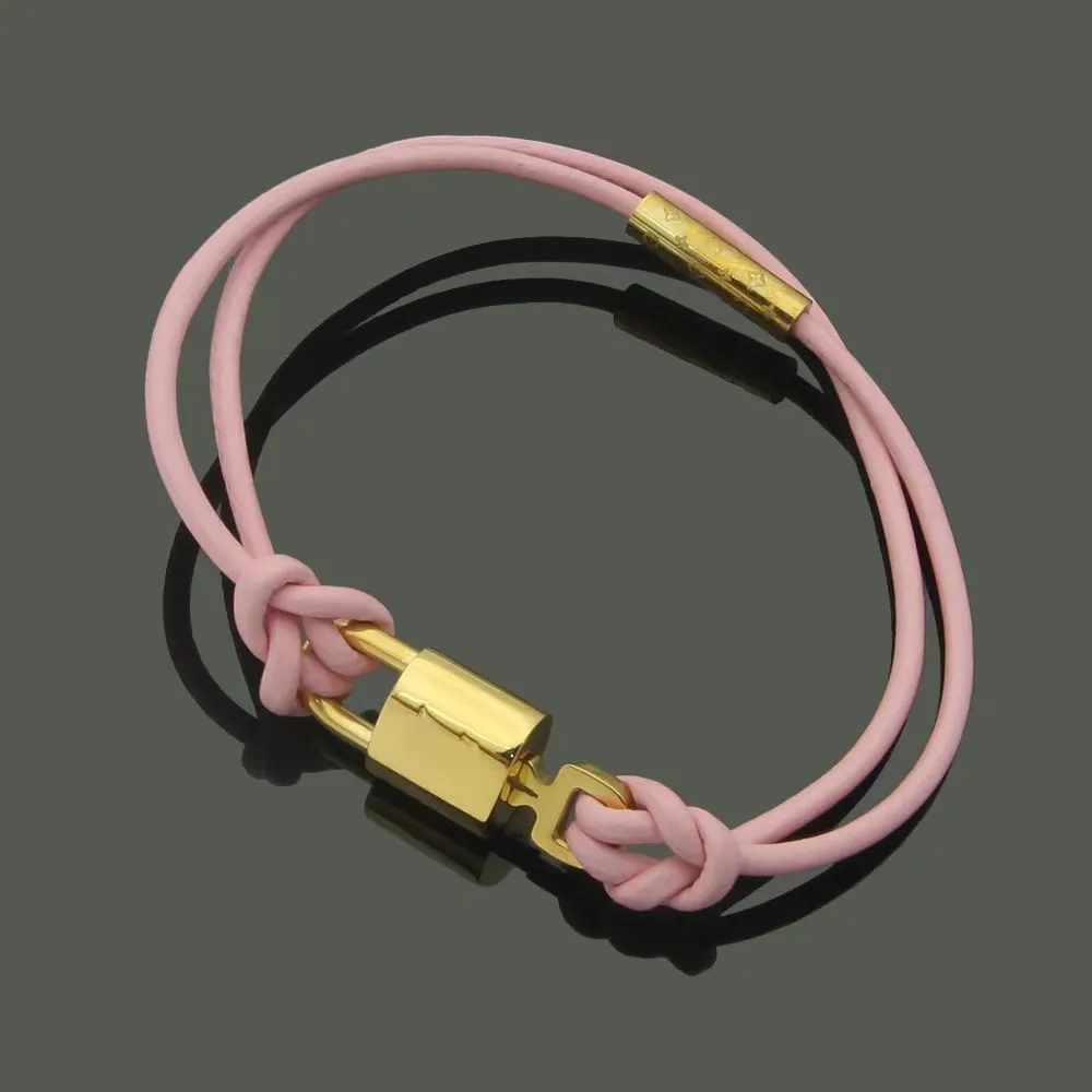 Bracciale charm con lucchetto dorato design in acciaio inox_voghion.com