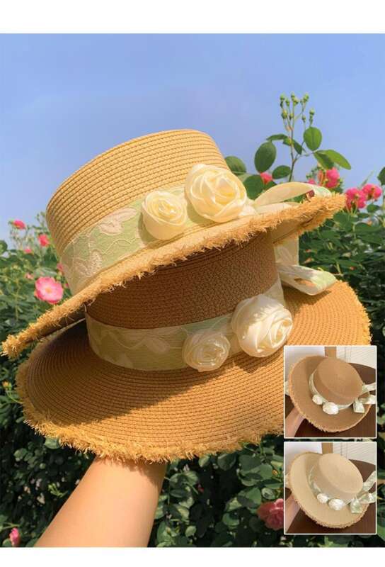 Cappello da spiaggia estivo da donna con tesa larga e fiore in paglia con fiocco e parte superiore piatta Lafite_voghion.com