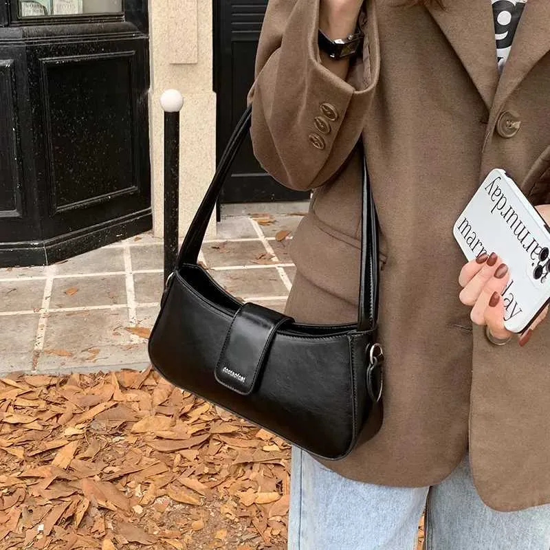 Fashion Shoulder Axillary Solid Color Niche Black Small Square Bag Leisure Versatile Lady Commuter Bags Crossbody_voghion.com