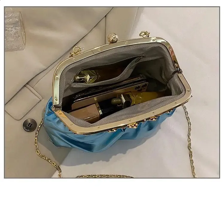 Borsa a tracolla pochette da sera in pelle effetto laser_voghion.com