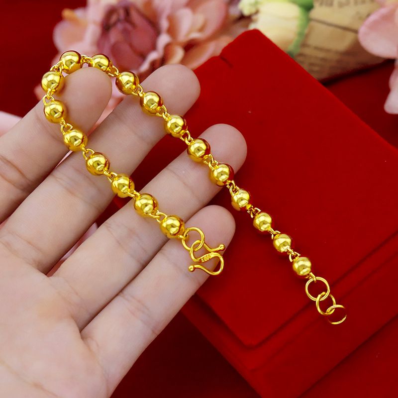Bracciale con perline dorate da donna elegante tondo liscio_voghion.com