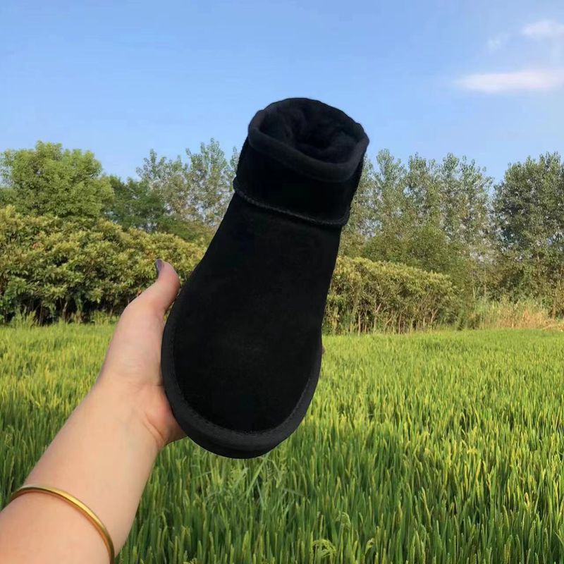 Rindslederwolle Braun Flache Absätze Lederfell Integrierte Runde Zehen Klebeschuhe Niedrig Geschnittene Mini-Schneestiefel_voghion.com