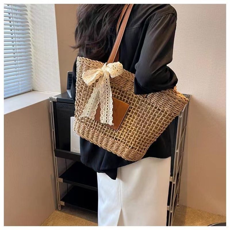 hollow shoulder new simple straw woven holiday style beach versatile women's bag_voghion.com