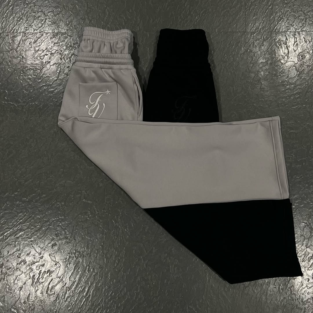 Vêtements pour hommes décontractés simples couple mode créative double taille broderie pantalons de survêtement pliants