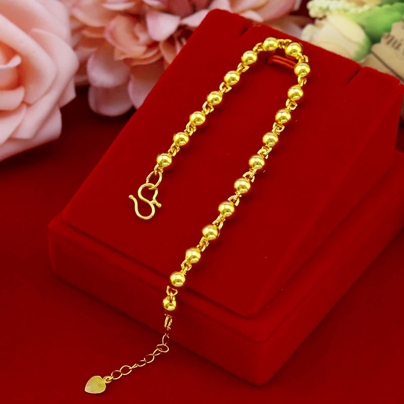 Bracciale con perline dorate da donna elegante tondo liscio_voghion.com