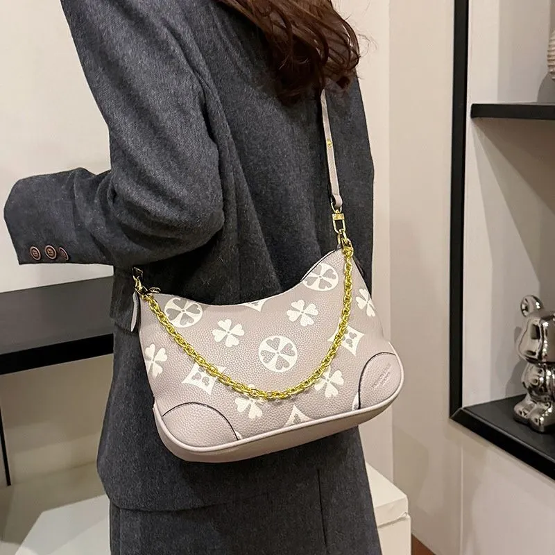 Free Shipping 2025 Designer Fashionable Commuting Dumpling Armpit Chain Carrying Shoulder Bag For Women_voghion.com