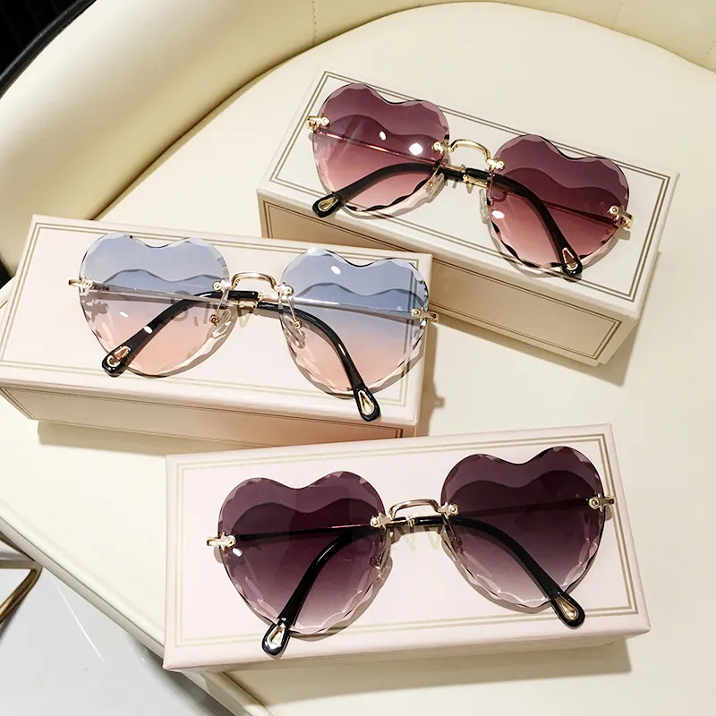 Hartvormige zonnebril dames randloze cat eye designer bril_voghion.com
