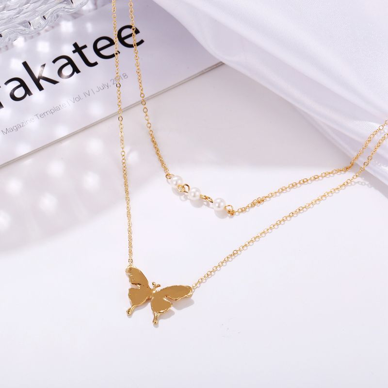 Collana con ciondolo a farfalla con doppia perla, catena per clavicola retrò creativa_voghion.com