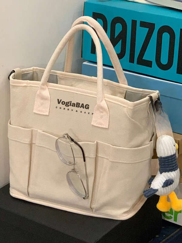 2025 Neue große Kapazität Outdoor Pet Leichte Mama Baby Canvas Damen Tragetasche_voghion.com