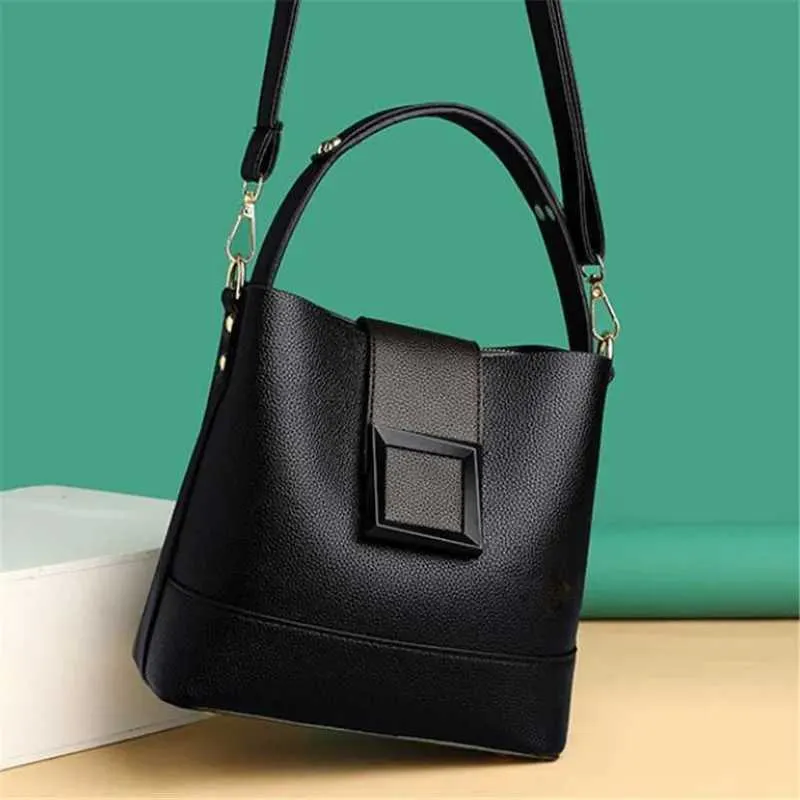 Borsa a secchiello in pelle da donna, elegante, con manico superiore, comoda tracolla, design alla moda, borsa a mano, tracolla_voghion.com
