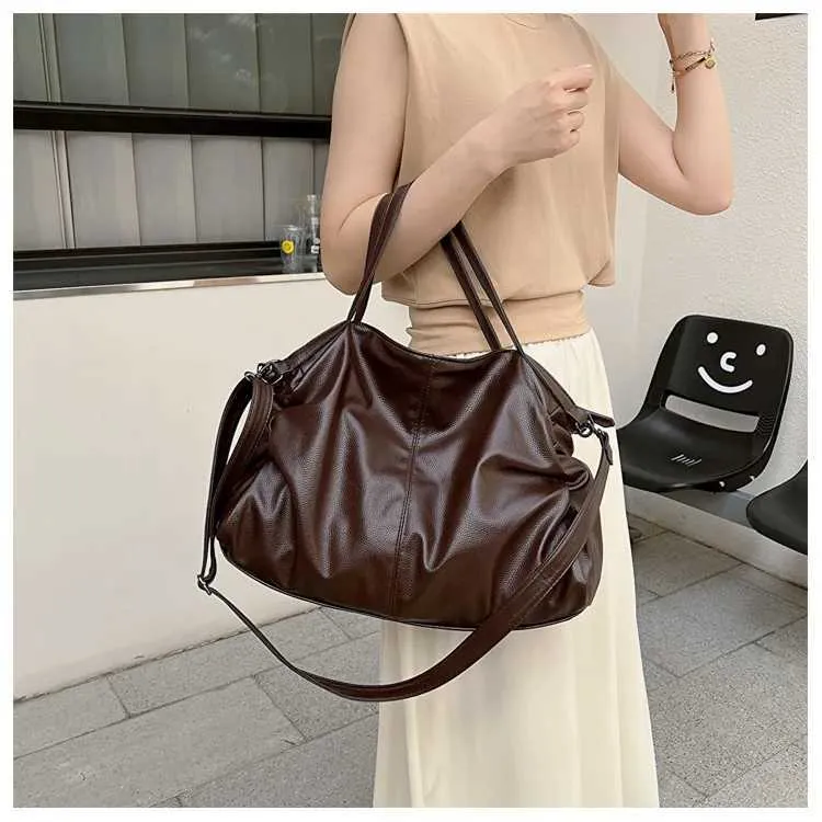 Large black shoulder large homeless shopping solid color high-quality leather cross body handbag womens travel bag_voghion.com