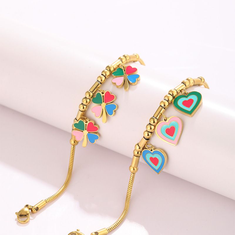 Bracciale personalizzato in acciaio inossidabile placcato oro con ciondolo a forma di quadrifoglio Dripping Love_voghion.com