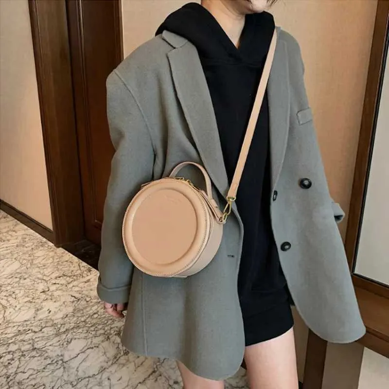 Sac à bandoulière de couleur unie pour petit sac à main rond pour femmes, sacs de créateurs de mode, sac à bandoulière en cuir, fermeture éclair pour femmes_voghion.com