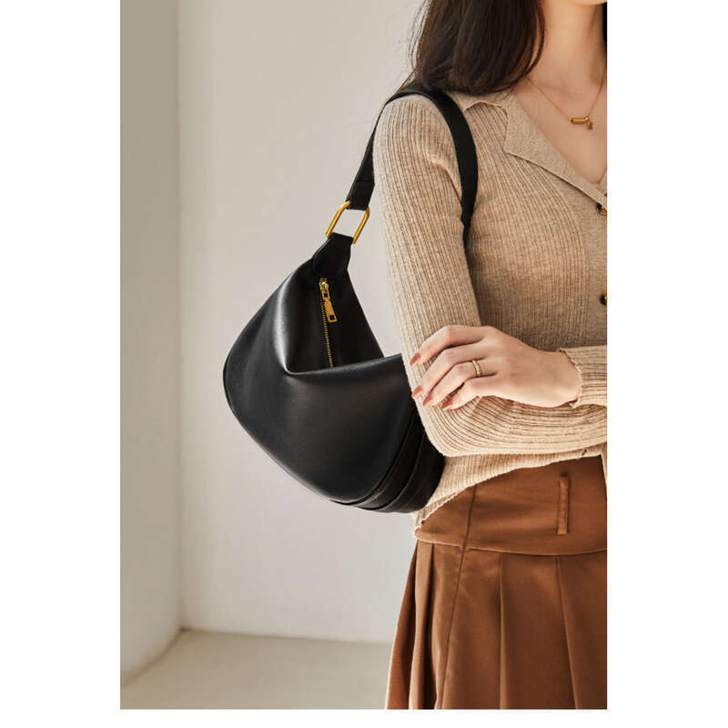 2025 Neue Frühjahrs- und Sommer-Hundert-High-End-Feeling-Knödeltasche Crossbody-Leder-Damen-Umhängetasche_voghion.com