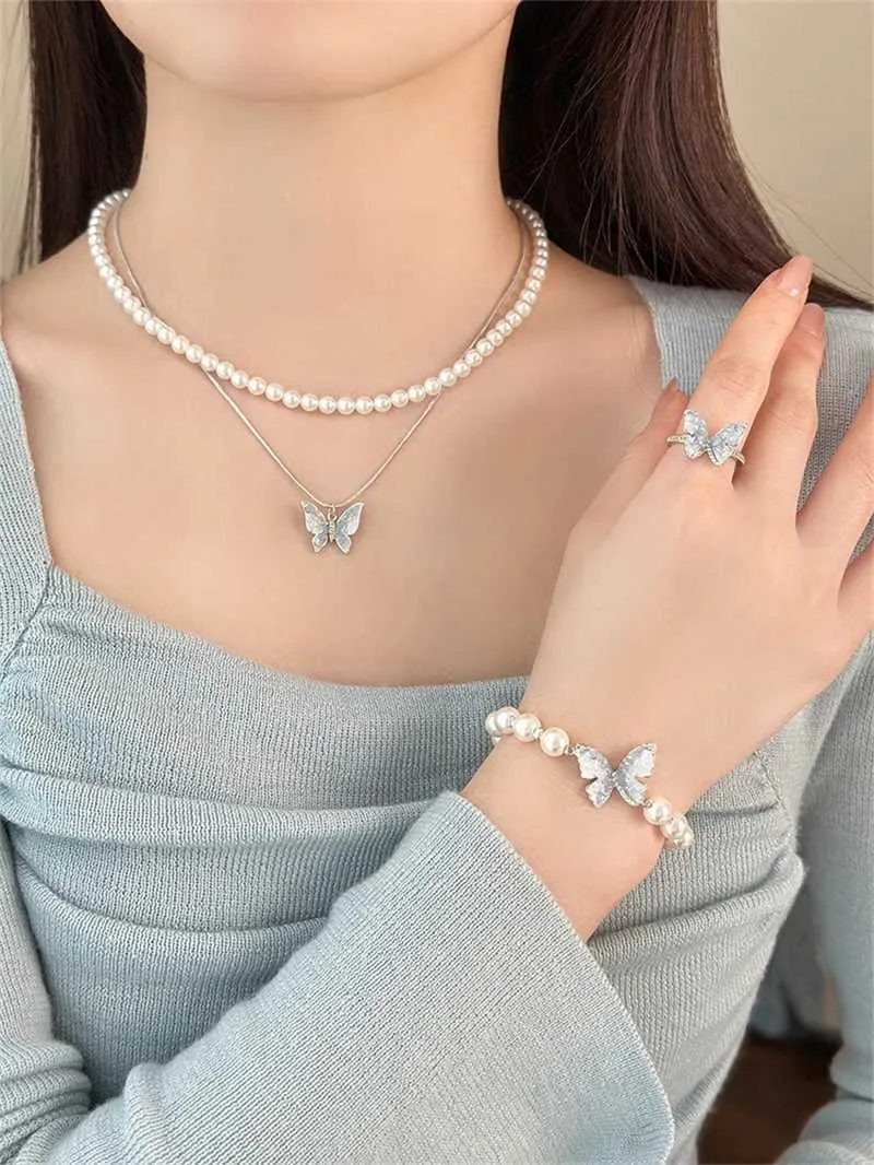 Schmetterling Ring Und Charm-armband Set Mit Kristall Und Perlen_voghion.com