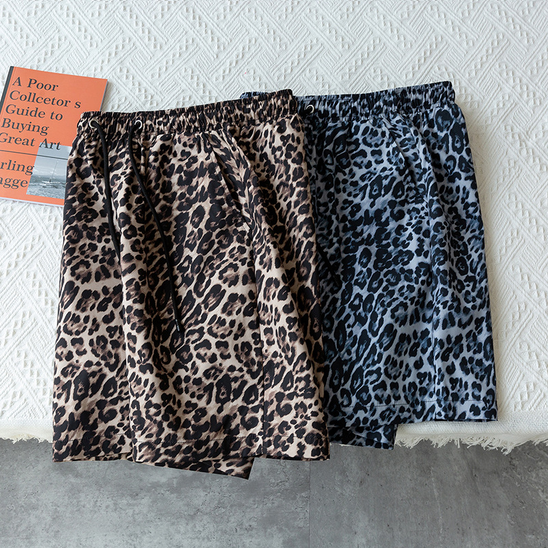 Vêtements pour hommes été 5 points imprimé léopard shorts hommes vêtements d'extérieur décontractés pantalons de plage couple mode 5 points pantalons shorts tendance_voghion.com