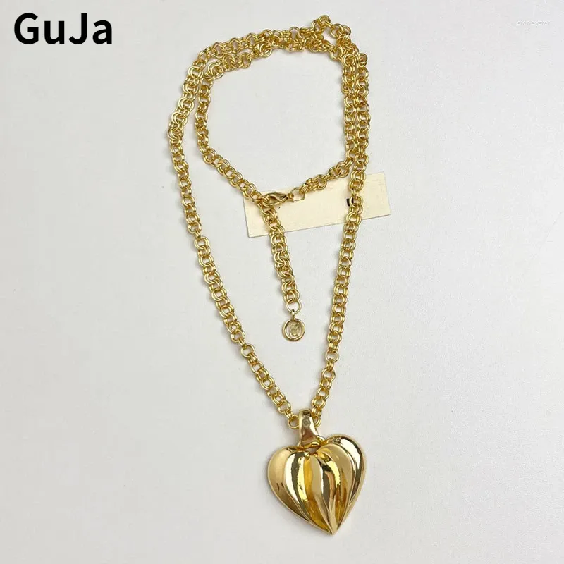 Collier avec pendentif en forme de cœur en métal doré pour femme, bijou tendance et vintage, idéal comme cadeau de fête_voghion.com