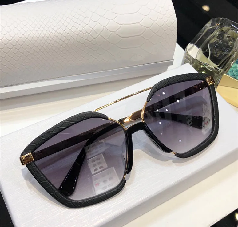 Wholesale- Brand Designer Sunglasses Metal Frame Charming Cat Eye Glasses Avant-garde Design Style Top Quality UV400_voghion.com