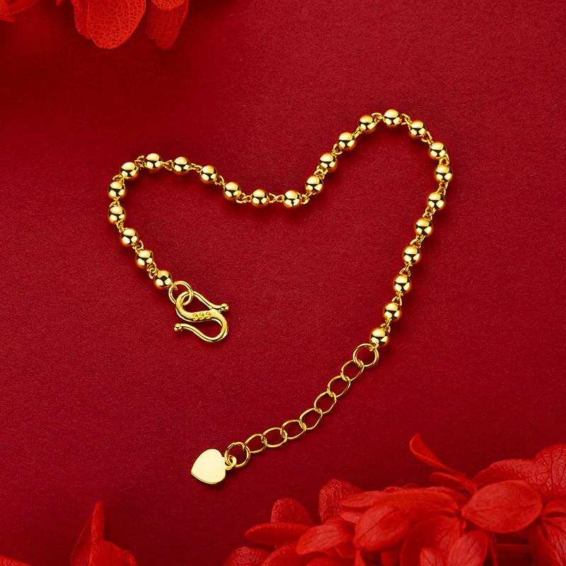 Bracciale con perline dorate da donna elegante tondo liscio_voghion.com