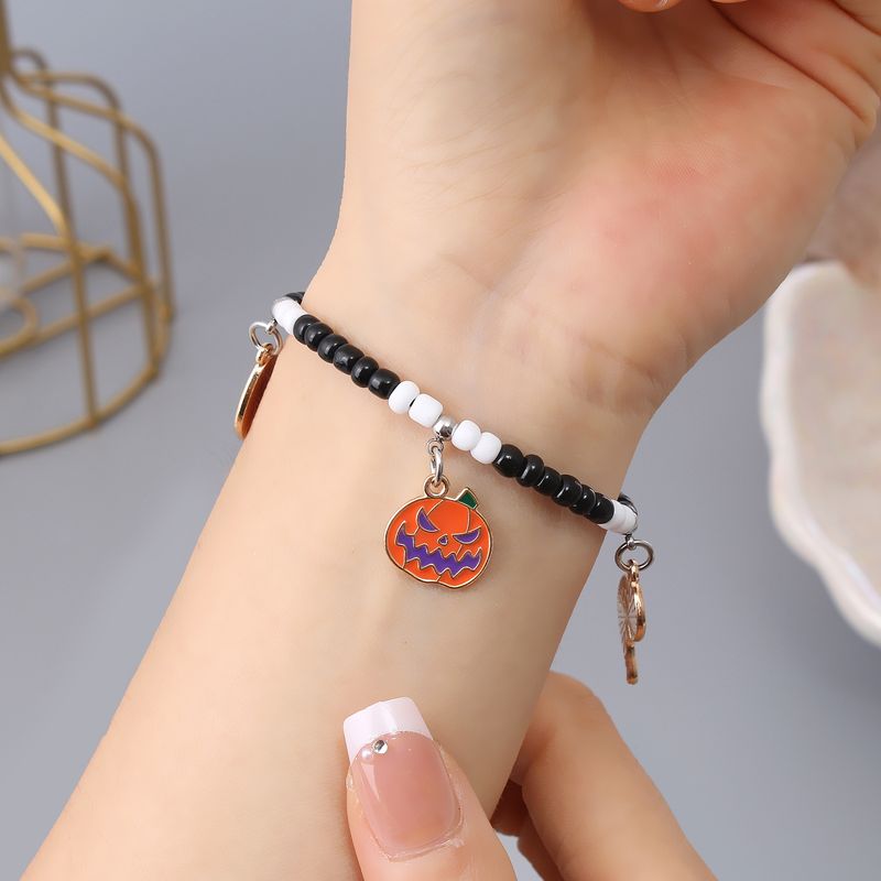 Halloween Kürbis Geistergesicht Schwarz-Weiß Reisperlen Handseil Armband_voghion.com
