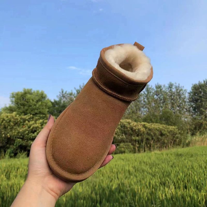 Rindslederwolle Braun Flache Absätze Lederfell Integrierte Runde Zehen Klebeschuhe Niedrig Geschnittene Mini-Schneestiefel_voghion.com
