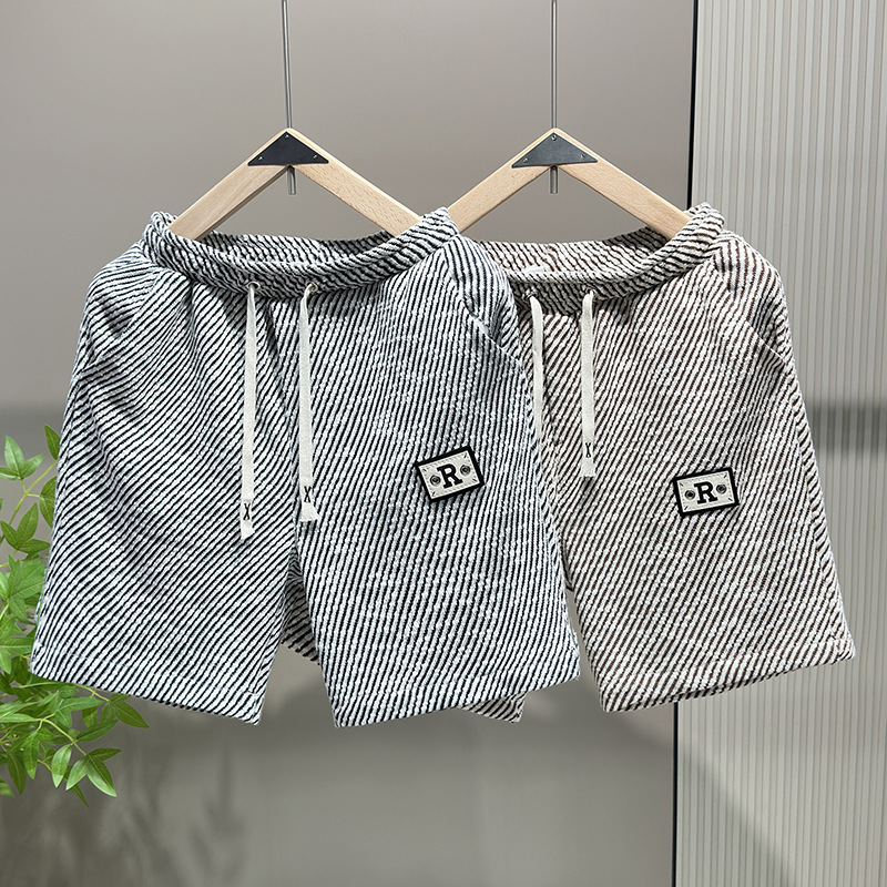 Vêtements pour hommes short haut de gamme hommes été élastique mode shorts décontracté hommes sport rayé grand pantalon pantalon de plage