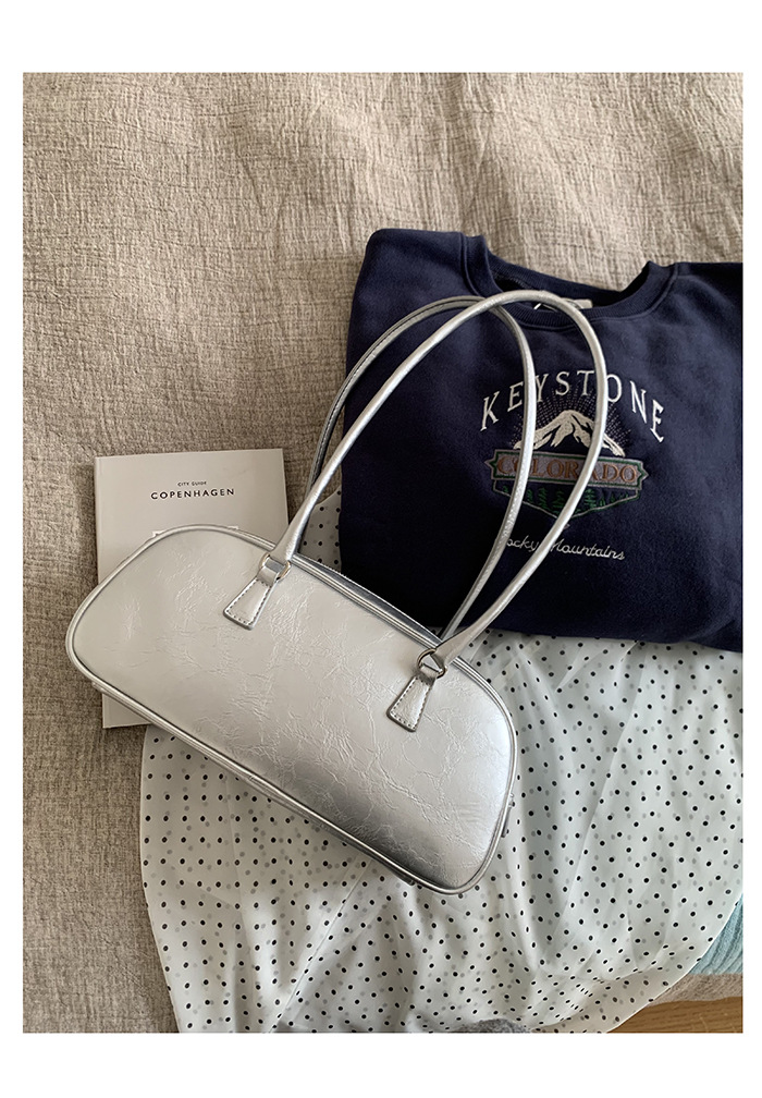 2024 Estate coreana Nuovo design di nicchia Borsa da donna portatile in stile balletto Tendenza moda Borsa versatile in argento con tracolla singola_voghion.com