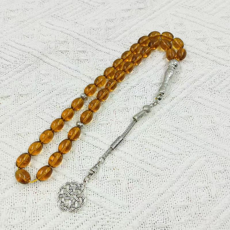 Braccialetto rosario unisex con 33 perle di riso e 8 cristalli_voghion.com