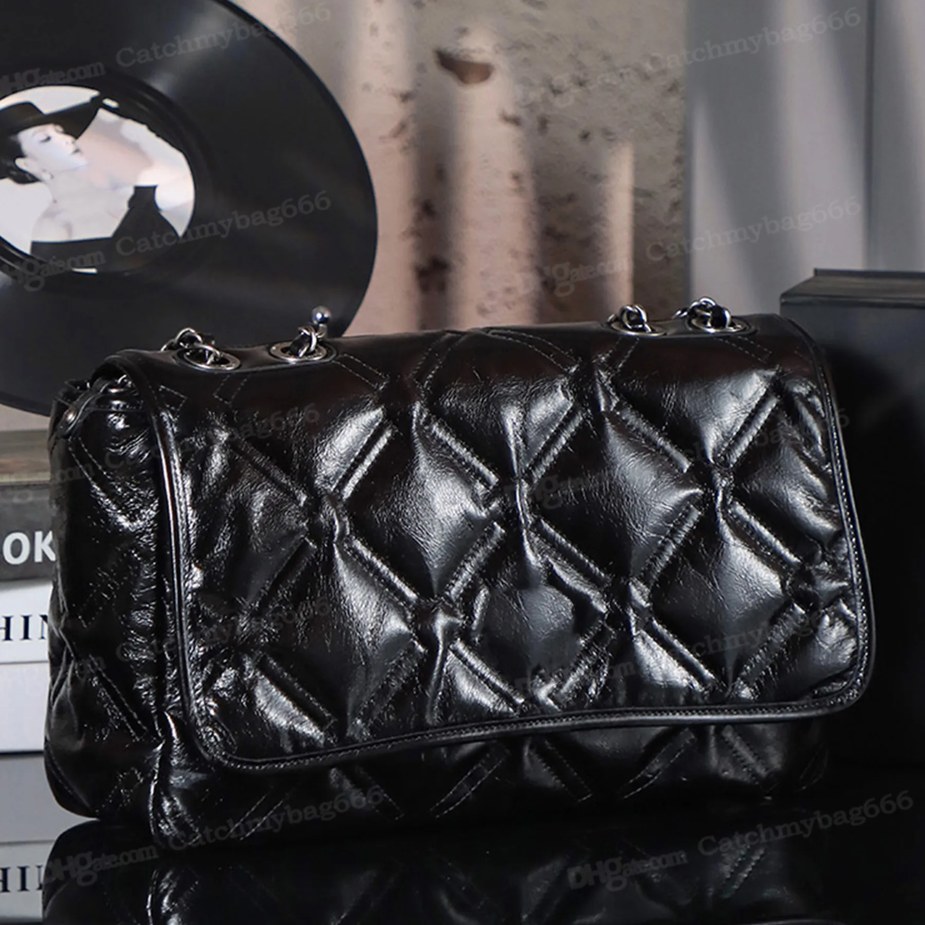 Borsa a tracolla con catena 10A di alta qualità, in morbida pelle genuina, con cerniera e tasca a pochette._voghion.com