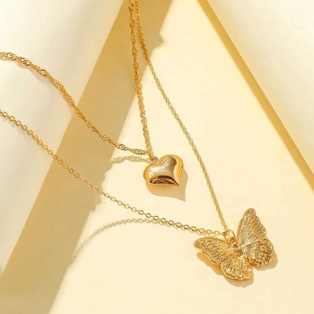 Colliers pendentifs rétro papillon doré en acier inoxydable avec chaîne serpent et breloque tendance pour femmes_voghion.com