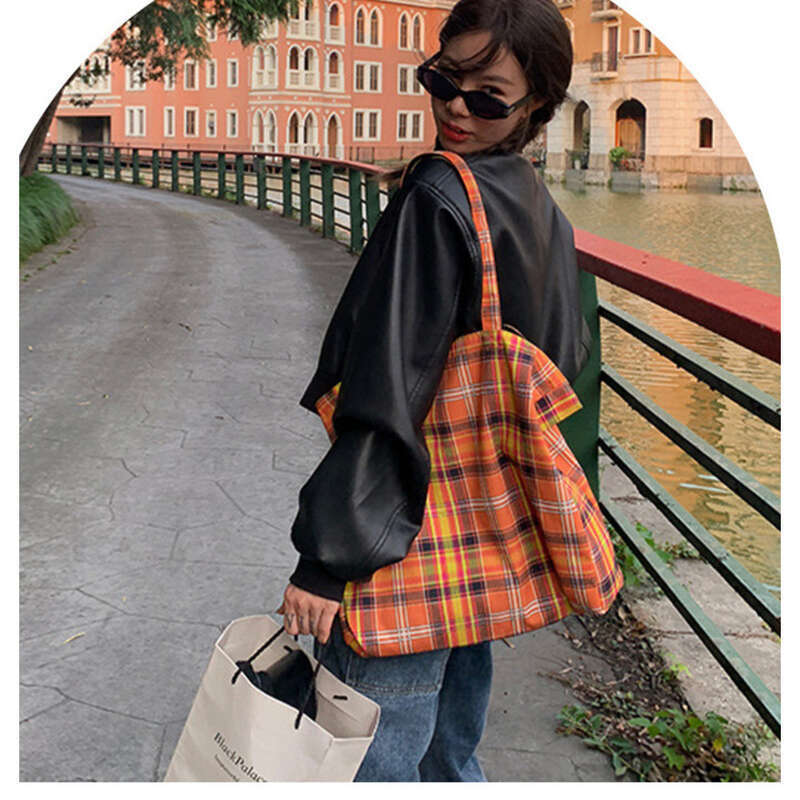 Nischen-Handtasche in Orange mit Karomuster, große Unterarm-Umhängetasche, schön und modisch_voghion.com