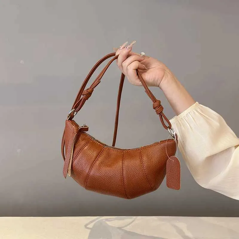 Modern damväska i äkta läder croissant axelremsväska_voghion.com
