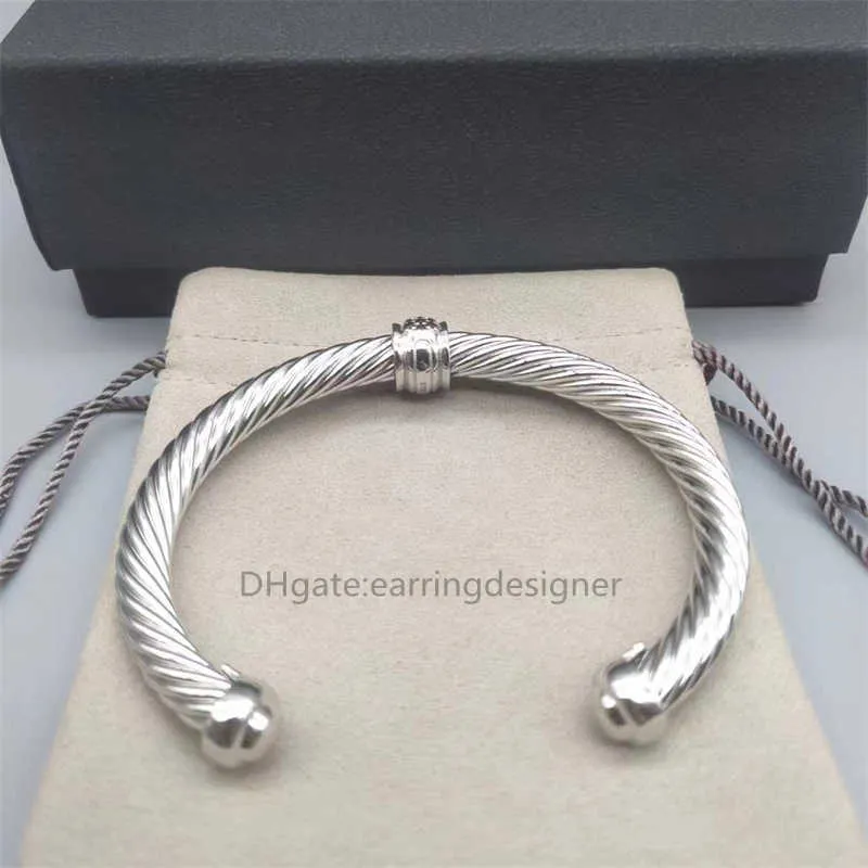 Bracciale a cavo dorato gioiello di design a manetta per donna_voghion.com