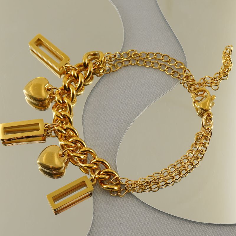 Braccialetto alla moda in acciaio inossidabile con combinazione di titanio, dorato, geometrico, design di nicchia per le donne_voghion.com