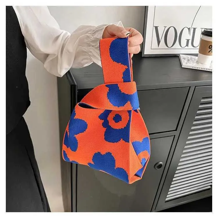 Borsa a mano in tela artistica giapponese di grande capacità, modello Geely, portafoglio con nodo casual e borsa da polso alla moda e versatile Wens_voghion.com