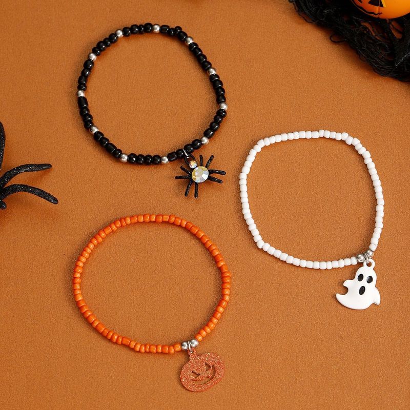 Braccialetto combinato di perline con ragno, fantasma, zucca e buffo simbolo di Halloween_voghion.com