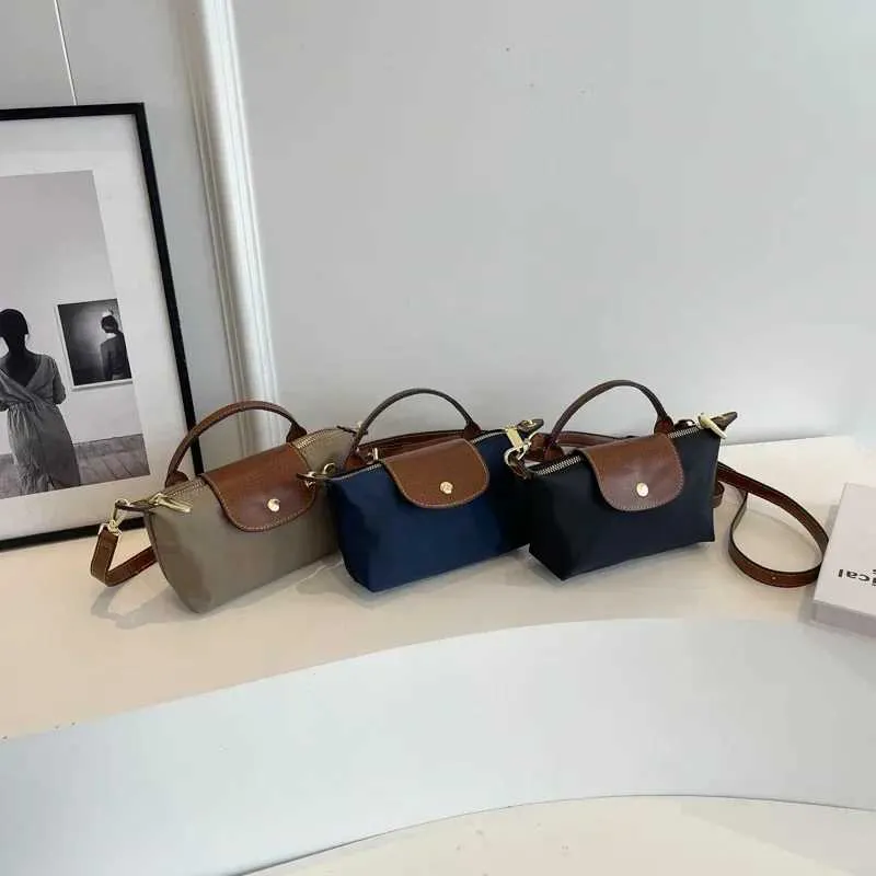 Designer Shell Shoulder Fashion Wallet and Handbag Womens Cross Body Bag Small Backpack Cute Tramp Y241123_voghion.com