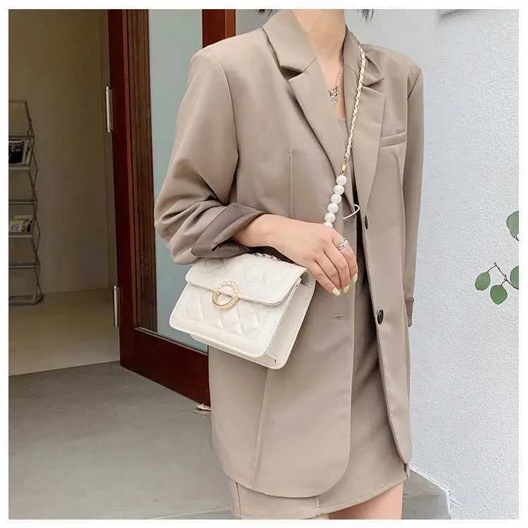 Borsa a spalla e tracolla elegante da donna con catena di perle_voghion.com