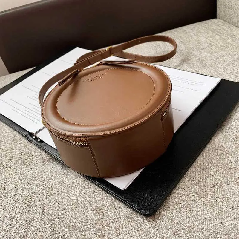 Sac à bandoulière de couleur unie pour petit sac à main rond pour femmes, sacs de créateurs de mode, sac à bandoulière en cuir, fermeture éclair pour femmes_voghion.com