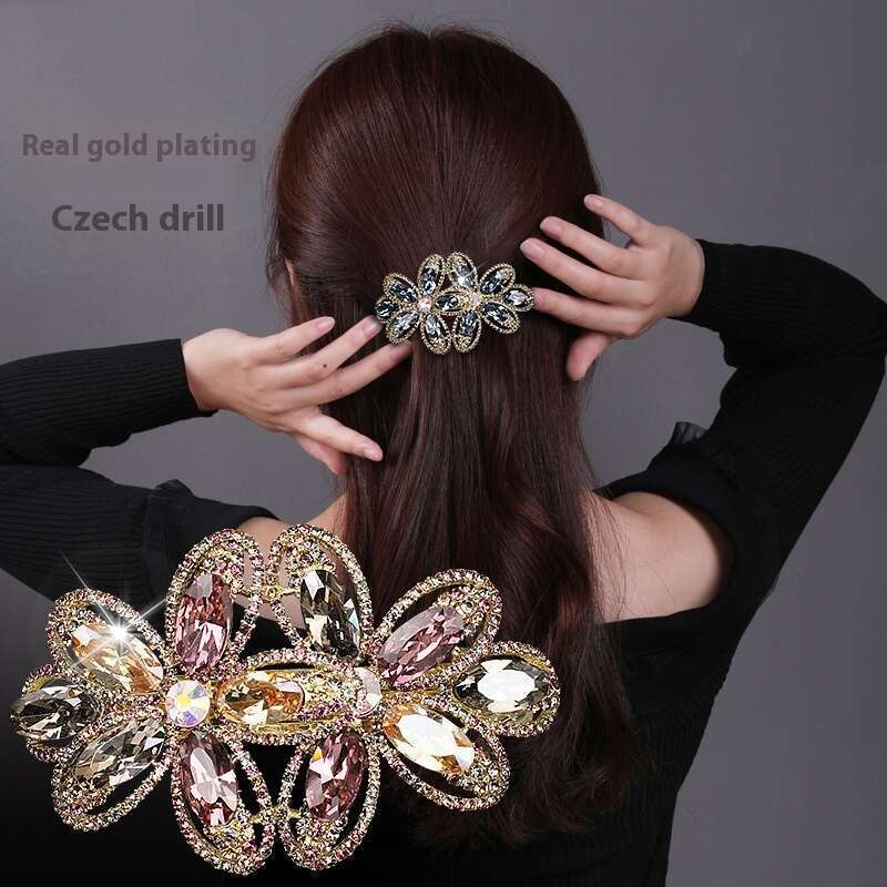Versión coreana: lazo con incrustaciones de diamantes de cristal, elegante temperamento chapado en oro real, clip de resorte para el cabello._voghion.com