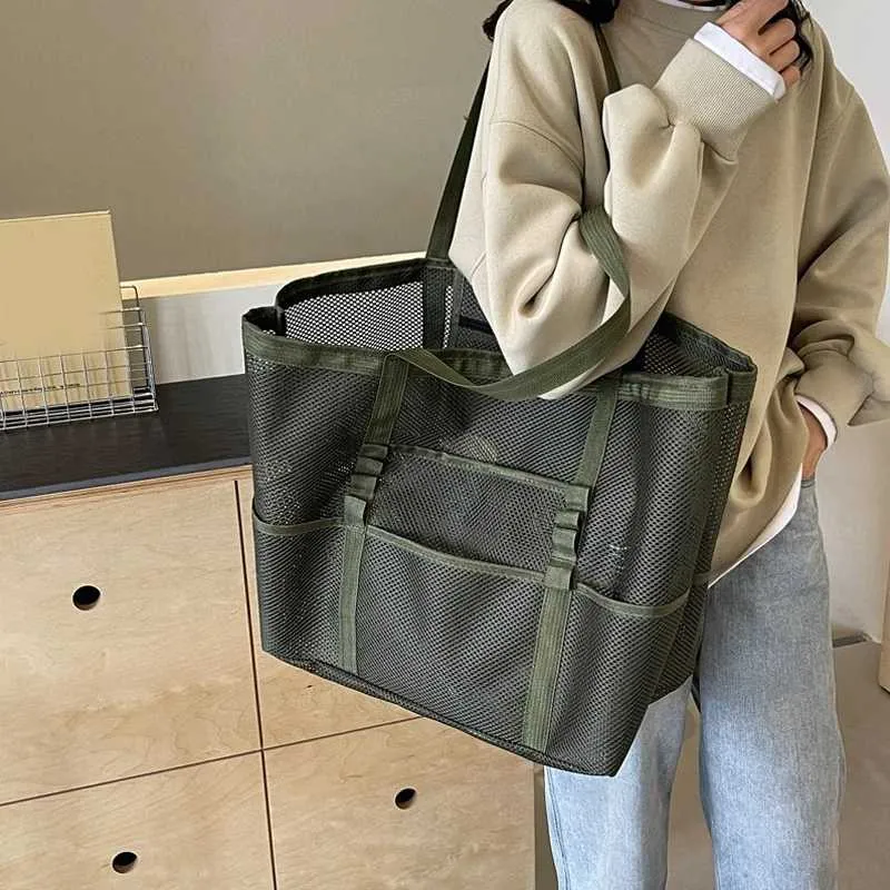 Bolsa de praia transparente de viagem de ombro de malha multifuncional feminina de grande capacidade de armazenamento de maquiagem Y241011_voghion.com