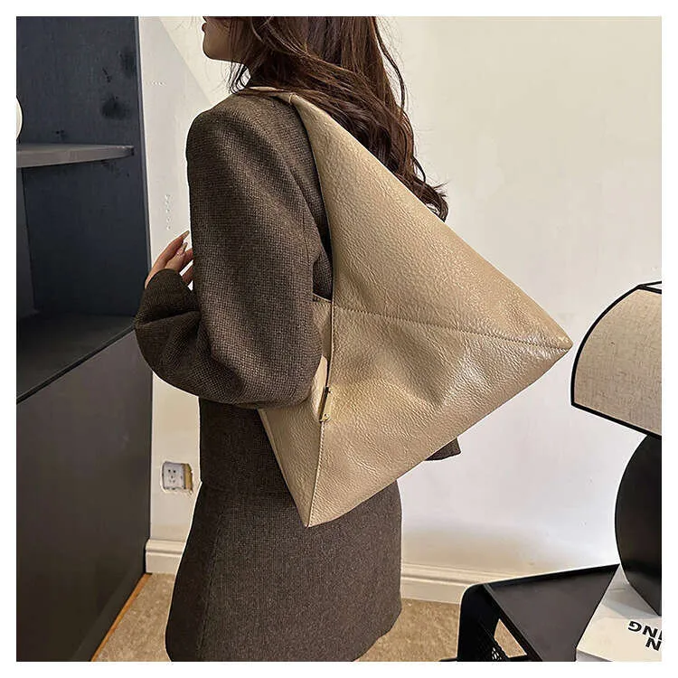 Modieuze driehoekige schoudertas voor dames elegante handtas_voghion.com