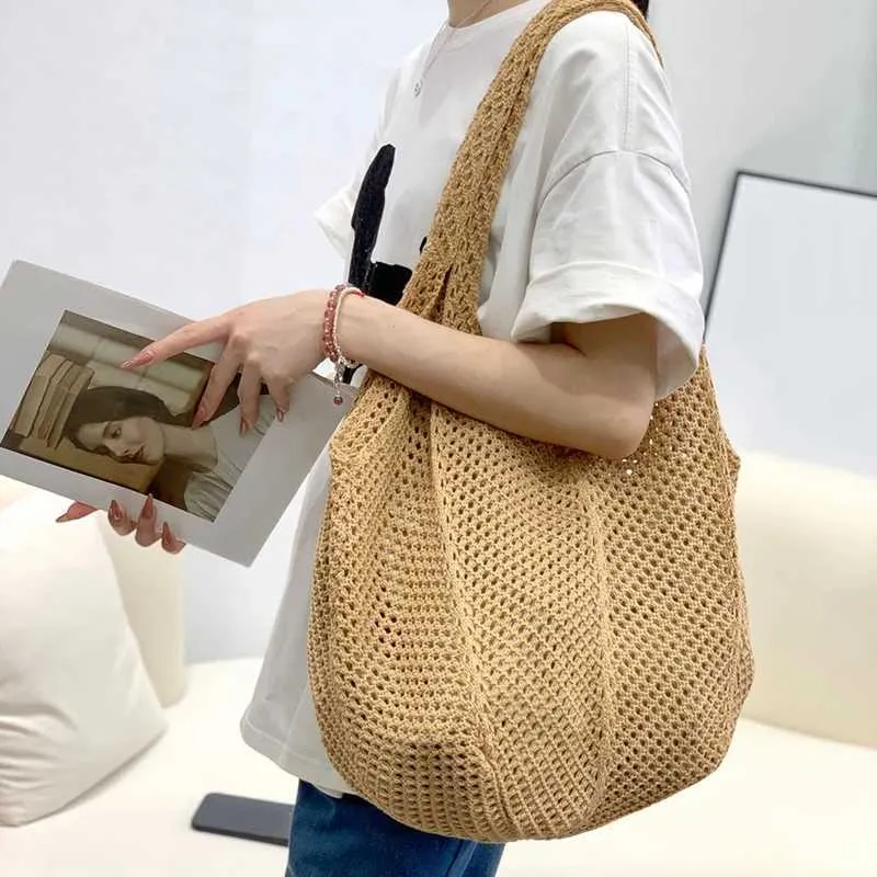 Womens crochet handbag mesh beach large capacity fashionable knitted shoulder solid color simple shopping bag Y241011_voghion.com
